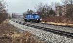 WE 7006 now heads to S Akron as it passes Quaker Square.